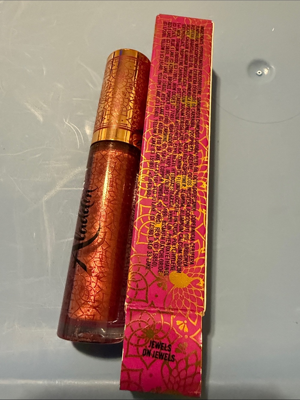 Disney Aladdin Metallic Copper-Orange Lip Gloss